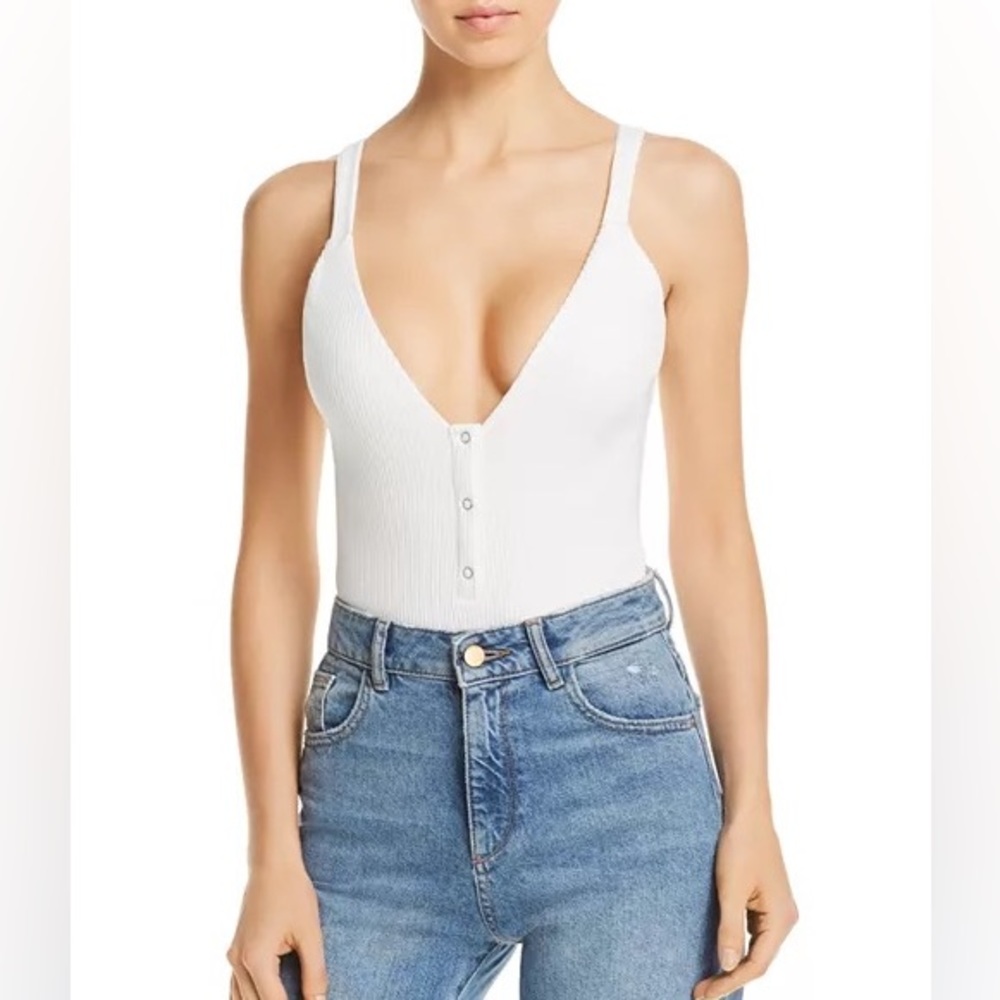 Purchased from Bloomingdale’s- New with Tags White Ribbed Bodysuit